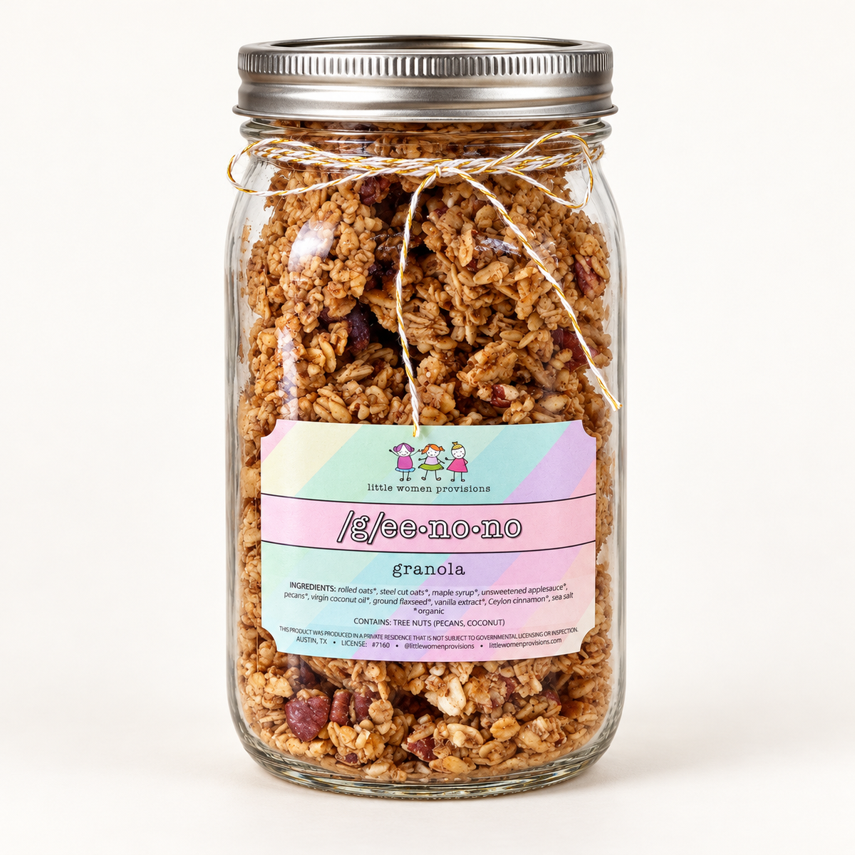 Geenono maple pecan granola in a 32oz glass jar tied with twine